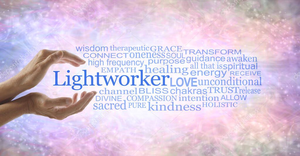 The healing hands of a Lightworker word cloud - female hands cupped around the word LIGHTWORKER beside a relevant word cloud on gently sparkling pastel coloured background 