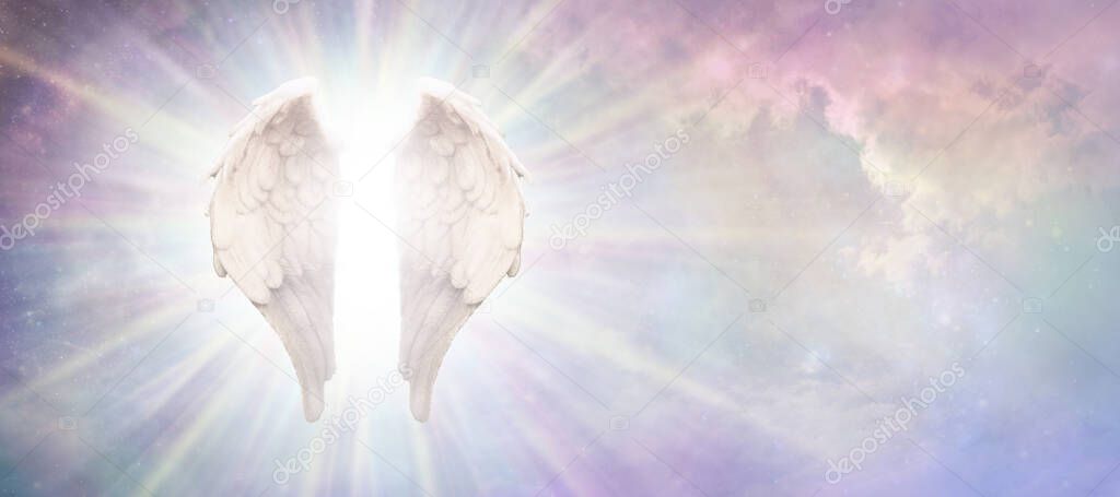 Heavenly Guardian Angel Concept Sky Banner - beautiful angelic wings with bright white light between floating in a pink blue ethereal sky background with copy space