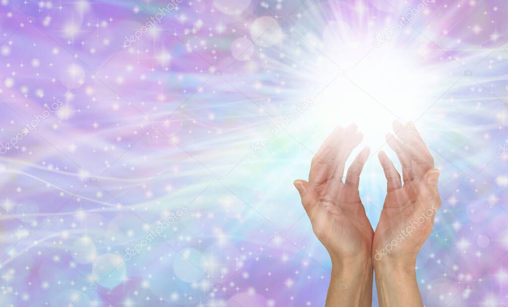 Healing Hands Message Banner - female cupped hands on right side reaching into white light above against a sparkling purple pink blue bokeh background with plenty of copy space