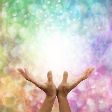 Rainbow healing energy on bokeh background clipart