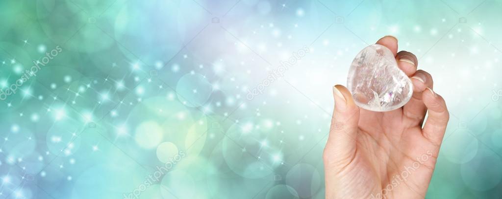 Crystal healing banner with bokeh green background
