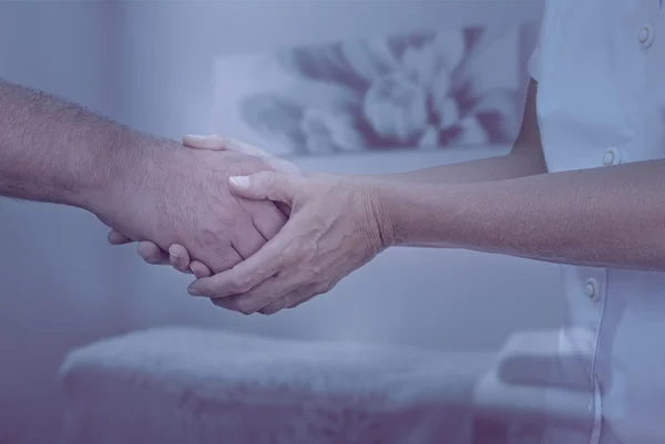 Therapist welcoming new patient — Stock Photo, Image