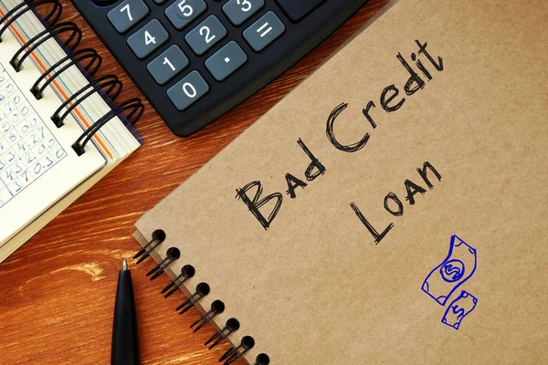 Financial concept about Bad Credit Loan with inscription on the piece of paper