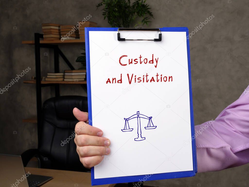 Custody and Visitation phrase on the piece of paper