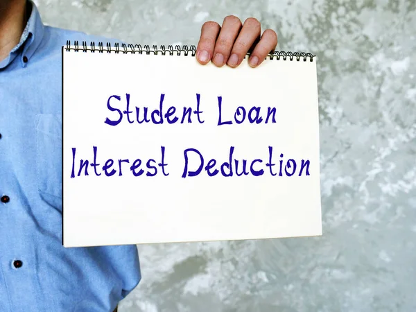 Financial concept about Student Loan Interest Deduction with sign on the piece of paper