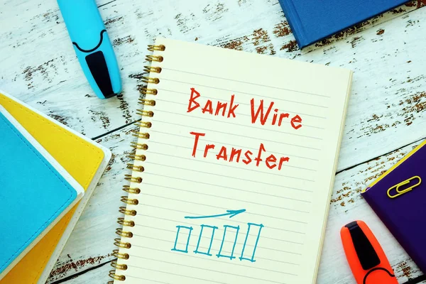 Financial concept about Bank Wire Transfer with sign on the piece of paper
