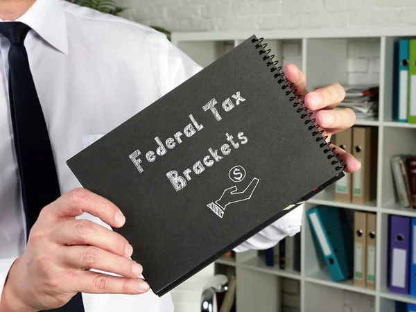 Финансовая Концепция Означает Федеральные Налоговые Брекеты Надписью Странице — стоковое фото