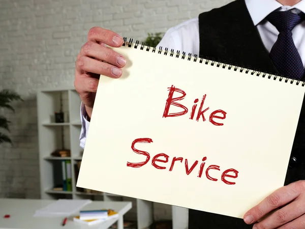 紙の上にフレーズと自転車サービスについてのビジネスコンセプト — ストック写真