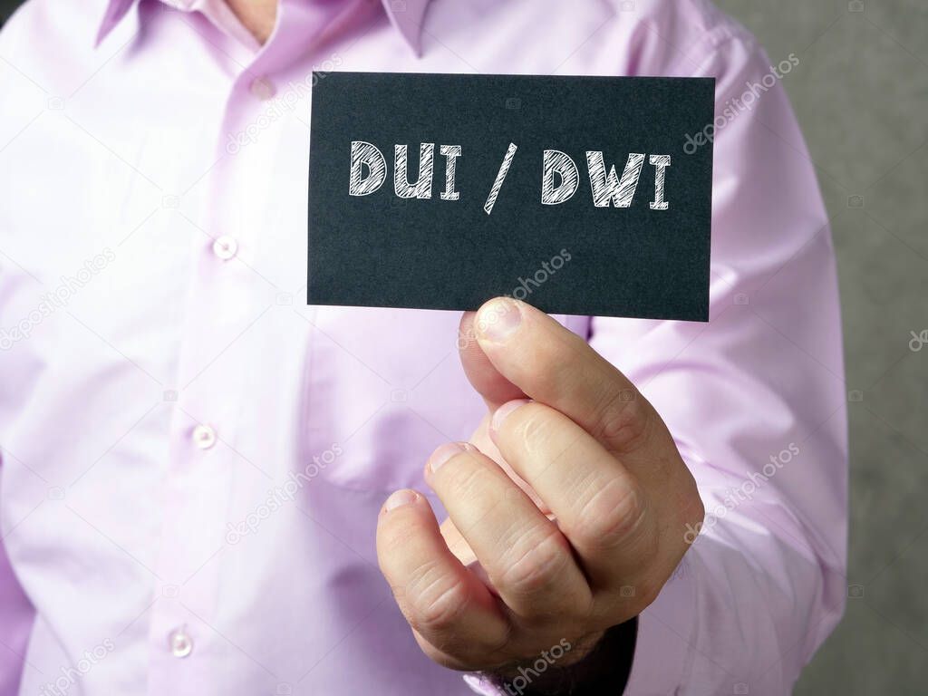 Business concept about DUI / DWI  with inscription on the sheet