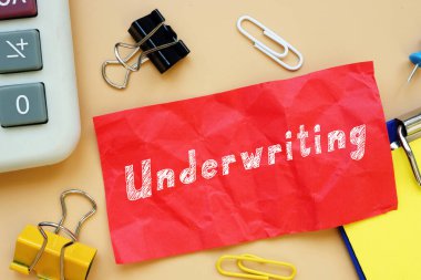 Conceptual photo about Underwriting with handwritten text clipart