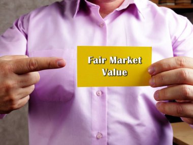 Business concept about Fair Market Value with phrase on the sheet clipart