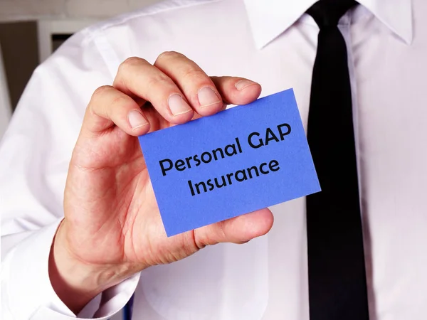 个人Gap保险的商业概念及其在纸上的签名 — 图库照片