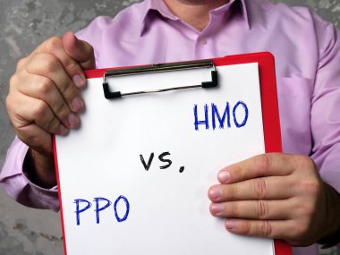  Financial concept meaning health maintenance organization HMO vs. PPO Preferred provider organization with phrase on the page clipart