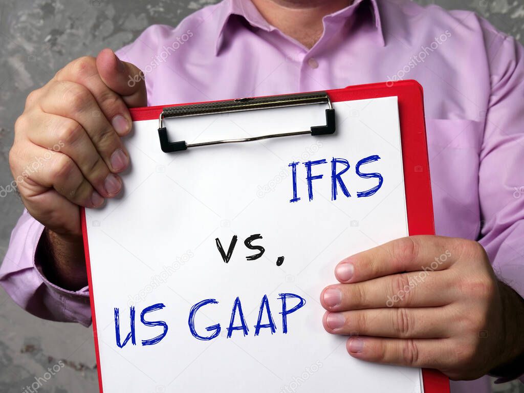  Financial concept about International Financial Reporting Standards IFRS vs. US GAAP Generally Accepted Accounting Principles with phrase on the sheet
