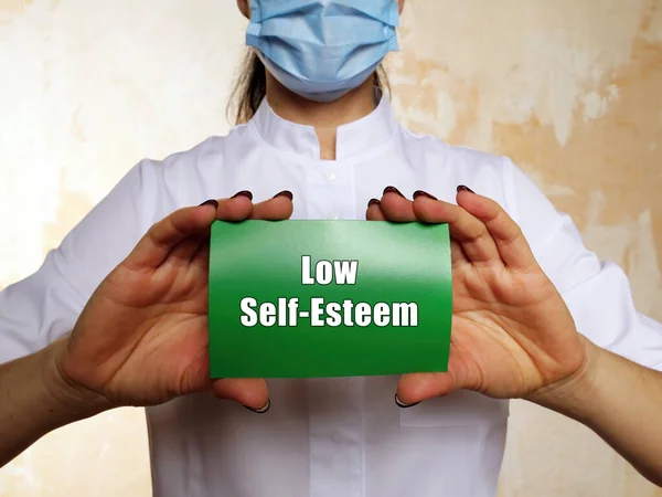 Low Self-Esteem phrase on the piece of paper