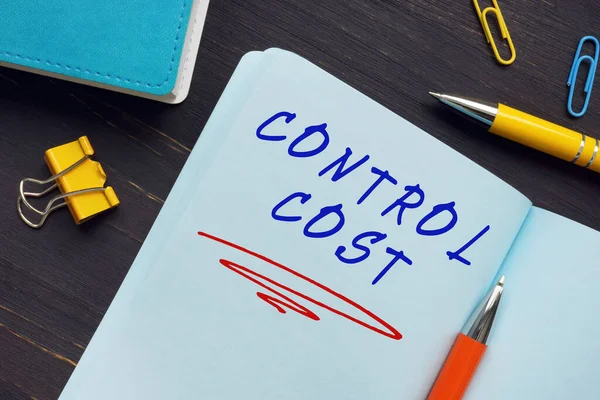 Business concept meaning CONTROL COST with phrase on the page. Cost control is the practice of identifying and reducing business expenses to increase profit