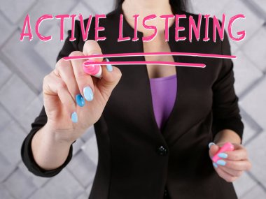  ACTIVE LISTENING phrase on the screen.  clipart