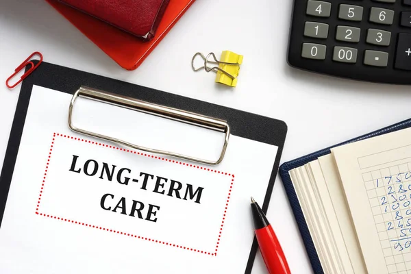 Financial concept about LONG-TERM CARE with sign on the piece of paper.