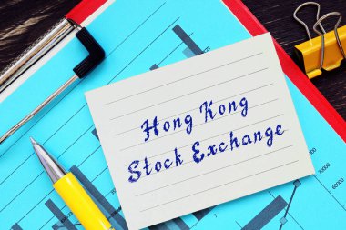 Business concept meaning Hong Kong Stock Exchange with phrase on the piece of paper clipart