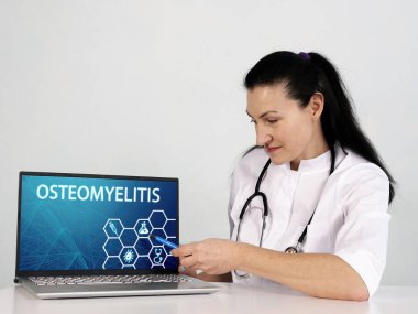 OSTEOMELITIS menü ögesini seçin. Doktor cep telefonu teknolojisi kullanıyor..