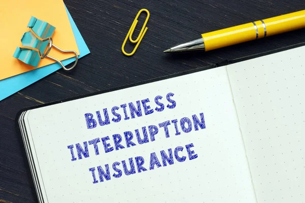 Business concept about BUSINESS INTERRUPTION INSURANCE with sign on the bank form