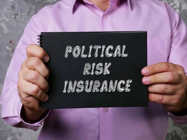 Business concept about POLITICAL RISK INSURANCE with phrase on the piece of paper.