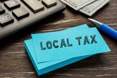 İş konsepti: üzerinde yazı olan LOCAL Vergisi.