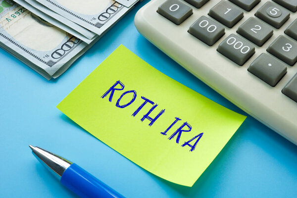 Business concept meaning ROTH IRA individual retirement account  with phrase on the page.
