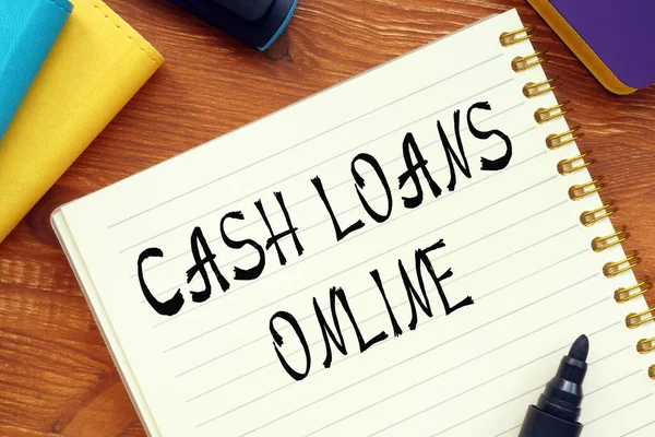 Cashに関するビジネスコンセプト Loans Online質問マークはページに記載されています — ストック写真