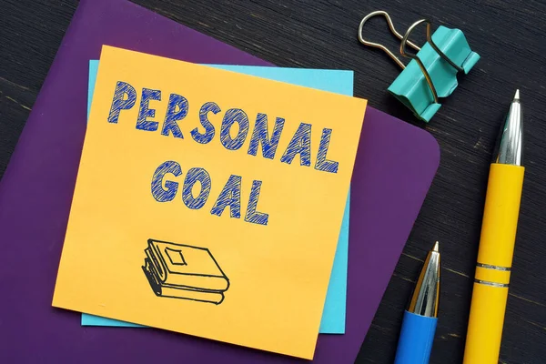 Business concept about PERSONAL GOAL with inscription on the sheet.