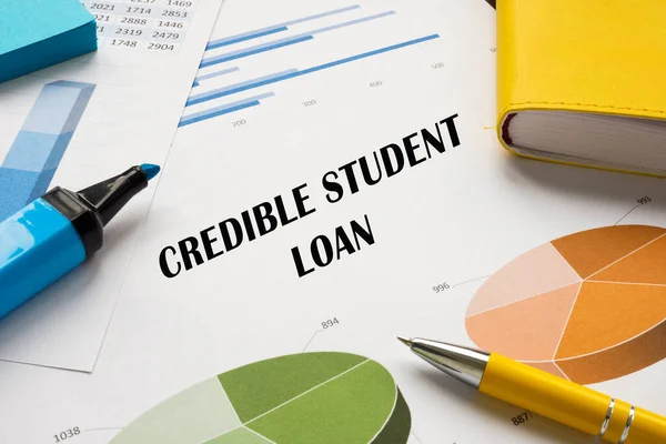 Business concept about CREDIBLE STUDENT LOAN with inscription on the piece of paper.
