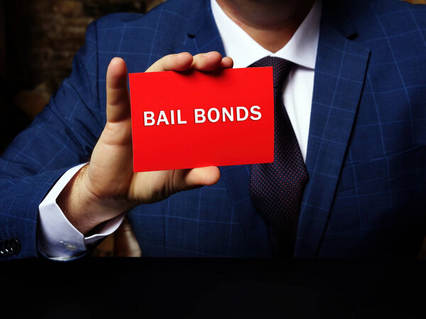 Conceptual photo about BAIL BONDS with written phrase. Conceptual photo showing an agreement by a criminal defendant to appear for trial or pay a sum of money set by the cour