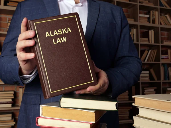Lawyer Holds Alaska Law Book Alaska Residents Subject Alaska State — Stock Photo, Image
