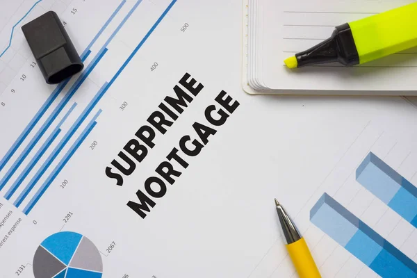 Financial concept about SUBPRIME MORTGAGE with phrase on the piece of paper.