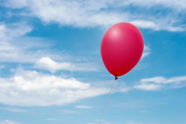 stock image red balloon in the sky