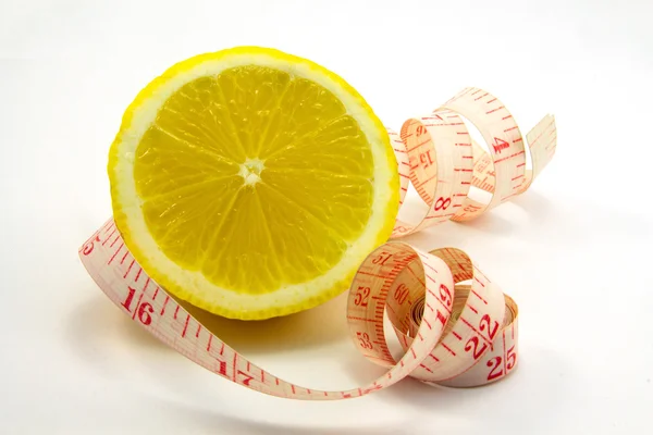 Lemon and ruler — Stock Photo, Image