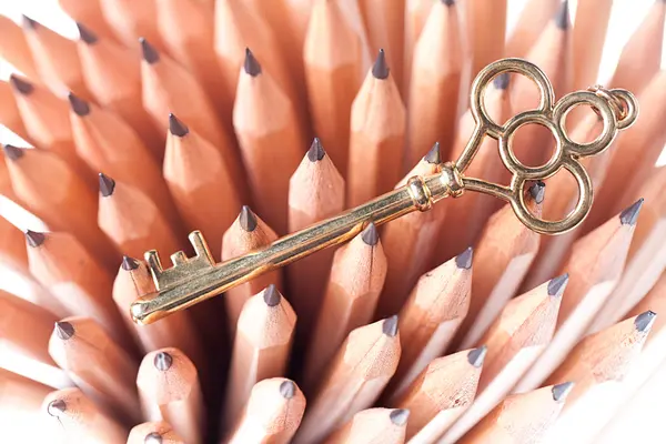 Pencils and key — Stock Photo, Image