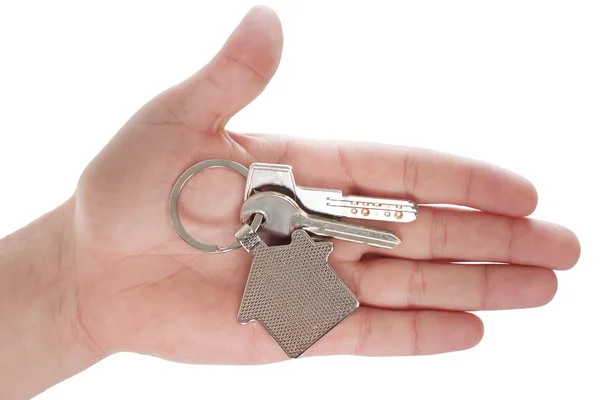 Closeup photo of mans hand holding keys — Stock Photo, Image
