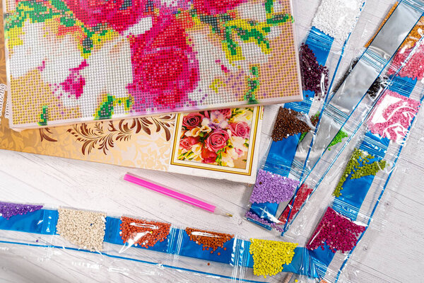 Set for beading. Beads in packages. Threads embroidery in the palette
