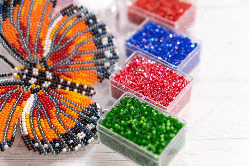 Colorful glass beads. Variety of shapes and colors to make a bead necklace or a string of beads women