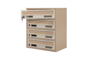 Beige ecru khaki color mailboxes on white background isolated. Mail box for entrance of apartment house. Metal mailbox