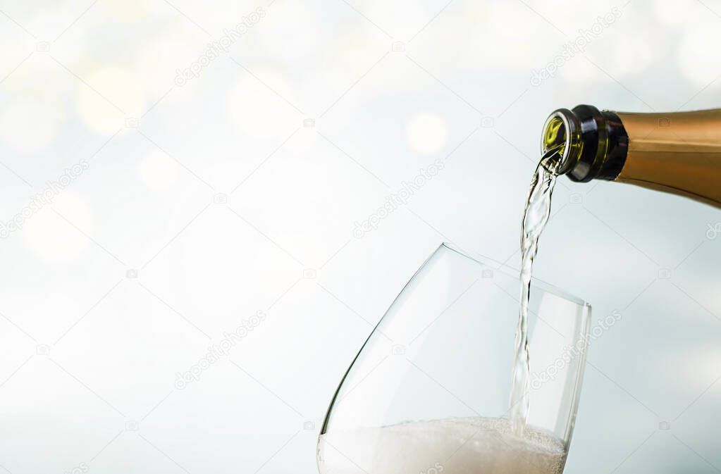 sparkling wine is poured into the glass