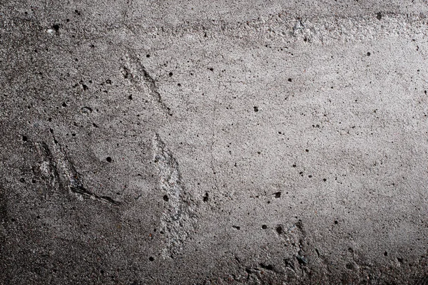 Beton gri duvarın hasarlı dokusu