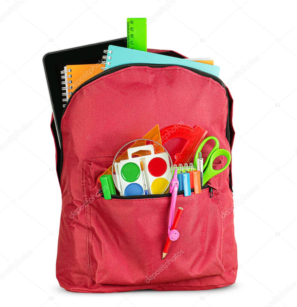 one red school backpack with digital tablet and stationery on isolated white background