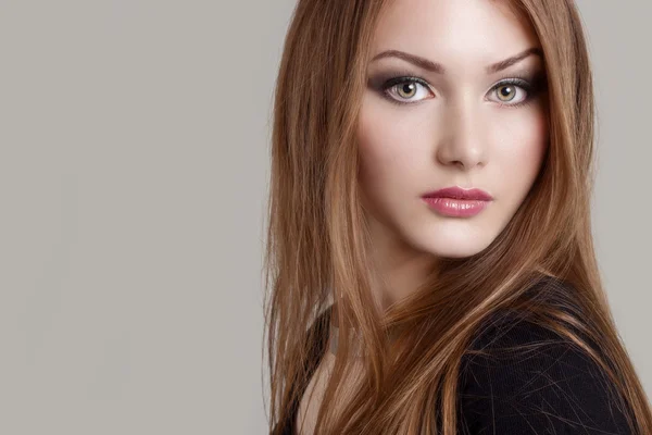 Portrait of a beautiful charming attractive gentle girl with expressive eyes — Stock Photo, Image