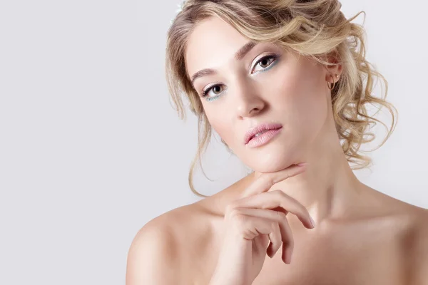 Beautiful young sexy elegant sweet girl in the image of a bride with hair and flowers in her hair , delicate wedding makeup