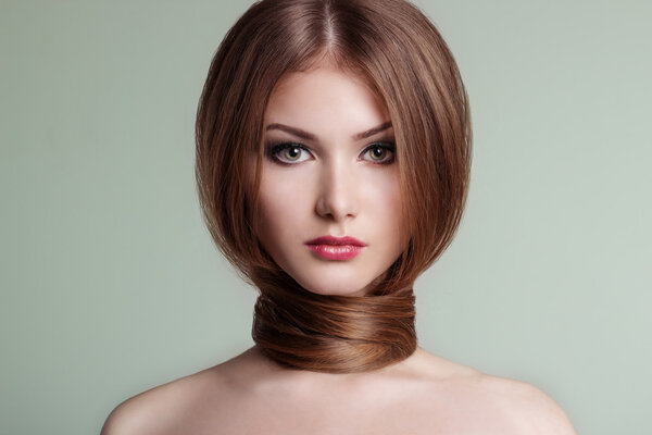 Beautiful sexy cute sweet girl with clean smooth skin with dark blond hair on the neck and bare shoulders