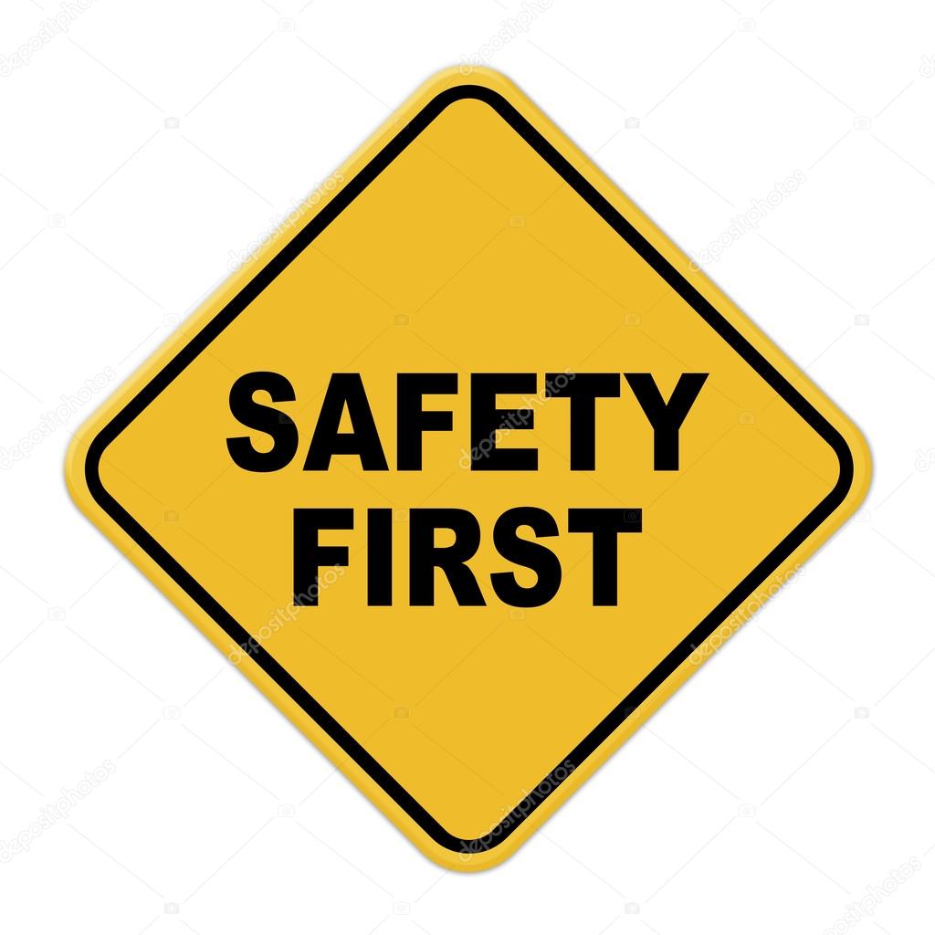 Large beveled yellow safety first road sign on white background