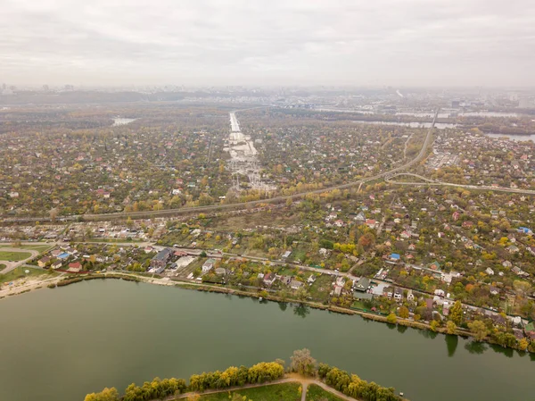 Aerial drone view. City lake near the private sector.