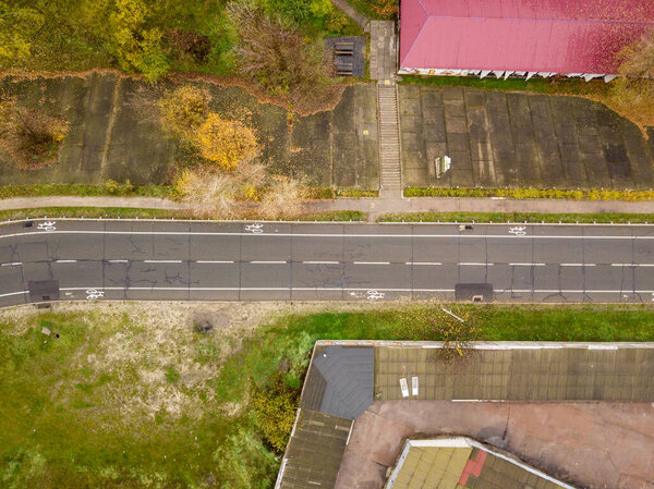Aerial drone view. Motor road with bicycle markings.